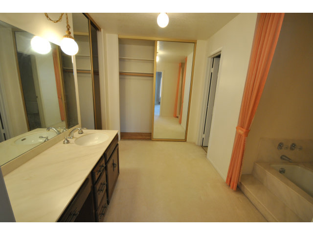 555 Palm Avenue, Unit 207 Millbrae, CA 94030 - Photo 15 of 21 a bathroom with a sink and a mirror
