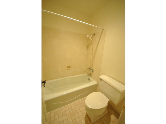 555 Palm Avenue, Unit 207 Millbrae, CA 94030 - Photo 20 of 21 a bathroom with a toilet and a bathtub
