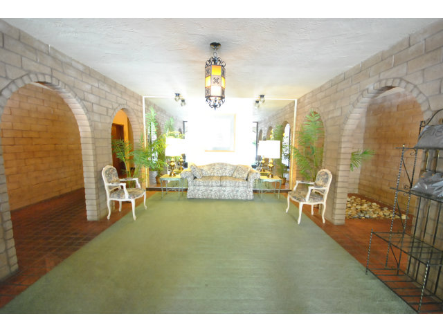 555 Palm Avenue, Unit 207 Millbrae, CA 94030 - Photo 2 of 21 a living room with furniture and wooden floor