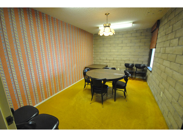 555 Palm Avenue, Unit 207 Millbrae, CA 94030 - Photo 3 of 21 a view of a dining room with furniture and a chandelier