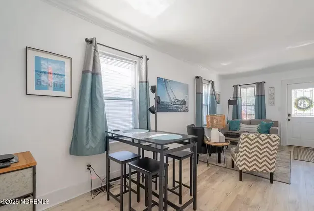 a view of a livingroom with furniture and window
