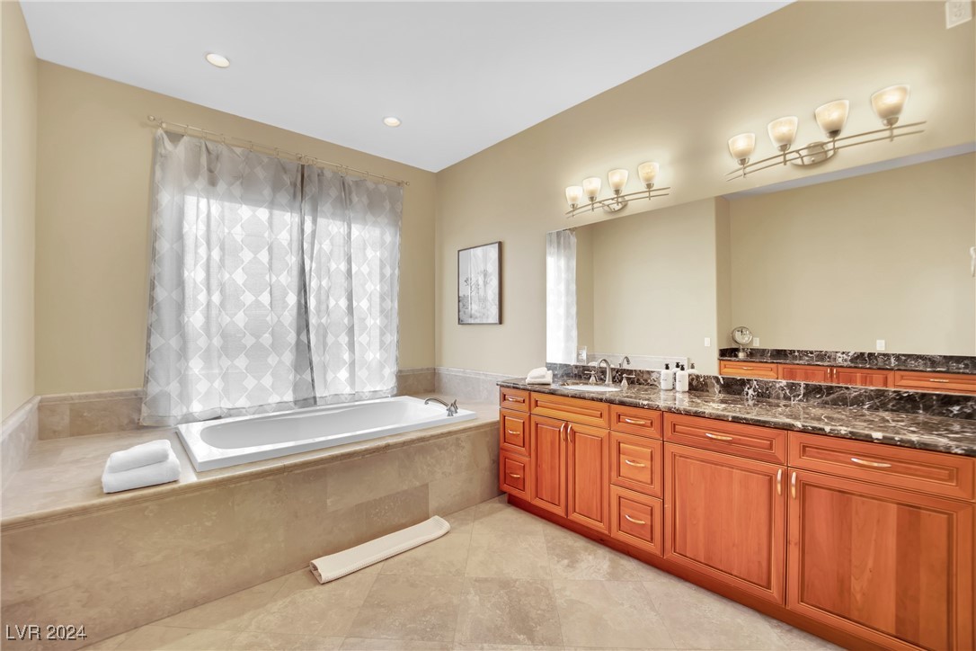 536 East Fairway Road Henderson, NV 89015 - Photo 22 of 38 The elegant spa tub, often positioned near a large