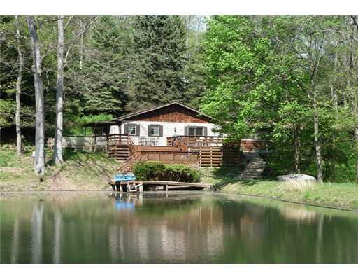 160 McFann Road Valencia, PA 16059 - Photo 1 of 18 Exterior Front. Chalet-style 3BR ranch home on 18+ acres is nestled in the woods and overlooking stocked lake!