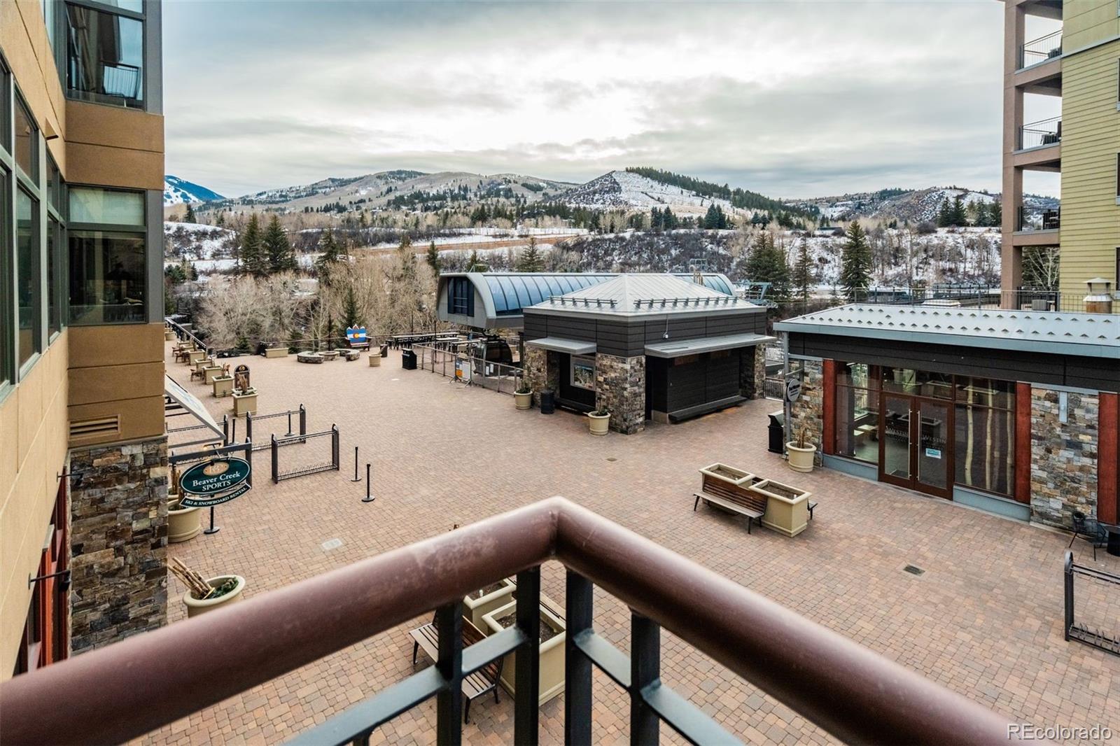 126 Riverfront Lane, Unit 200 Avon, CO 81620 - Photo 18 of 49 a view of a terrace with sitting area