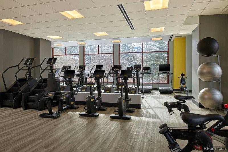 126 Riverfront Lane, Unit 200 Avon, CO 81620 - Photo 45 of 49 a view of a room with gym equipment