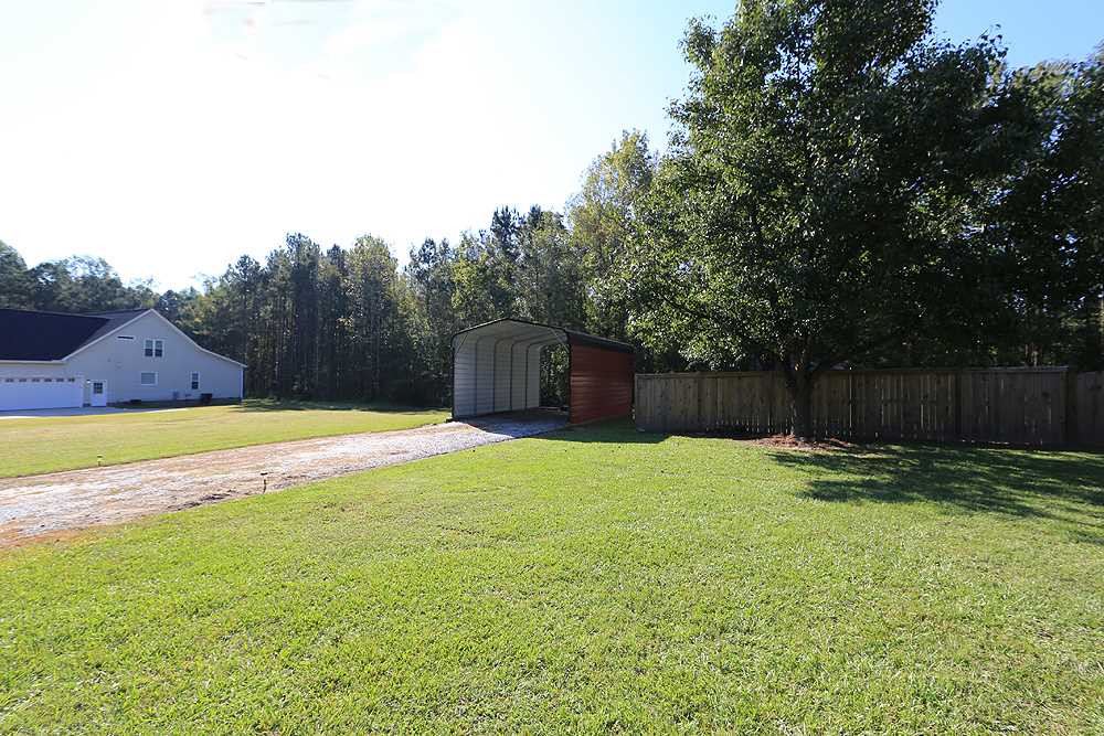 281 Wilson Jones Road Clayton, NC 27520 - Photo 23 of 25 Side Yard