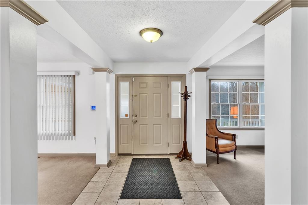 188 Congruity Road Greensburg, PA 15601 - Photo 12 of 50 a view of a room with gym equipment and windows