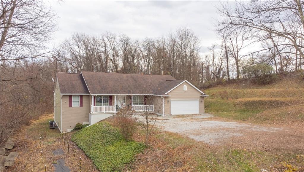 188 Congruity Road Greensburg, PA 15601 - Photo 39 of 50 a view of a yard in front of a house with large trees