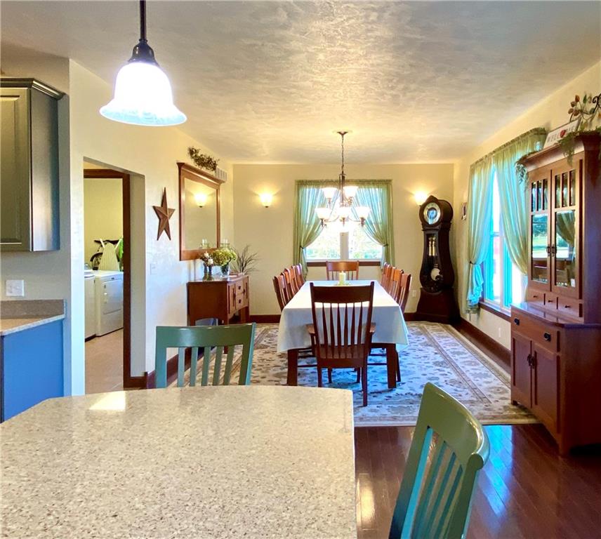 440 Wilson Road Worthington, PA 16262 - Photo 11 of 48 a living room with furniture and a chandelier