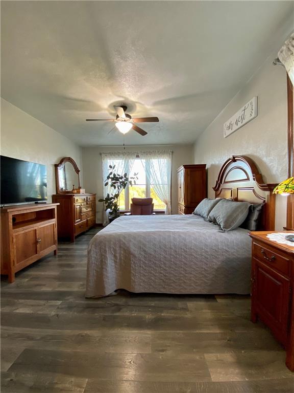 440 Wilson Road Worthington, PA 16262 - Photo 14 of 48 a bedroom with a large bed and a chandelier