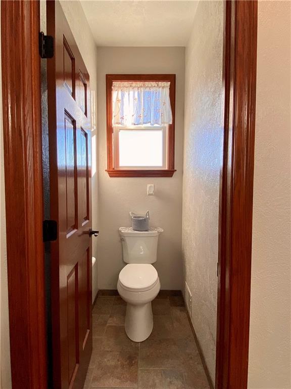 440 Wilson Road Worthington, PA 16262 - Photo 17 of 48 a bathroom with a toilet and a window