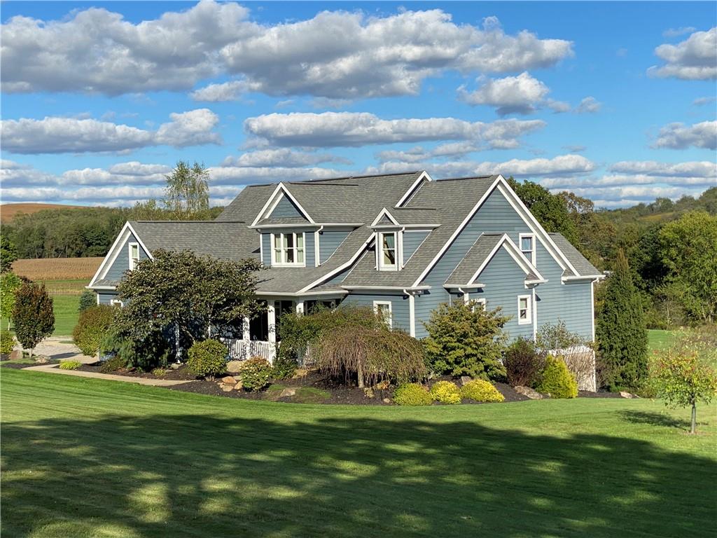 440 Wilson Road Worthington, PA 16262 - Photo 2 of 48 a front view of a house with a garden