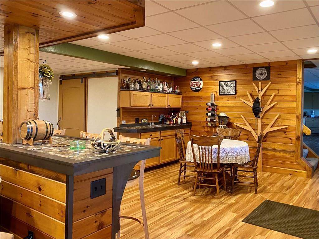 440 Wilson Road Worthington, PA 16262 - Photo 31 of 48 a living room with stainless steel appliances kitchen island granite countertop furniture and a wooden floor