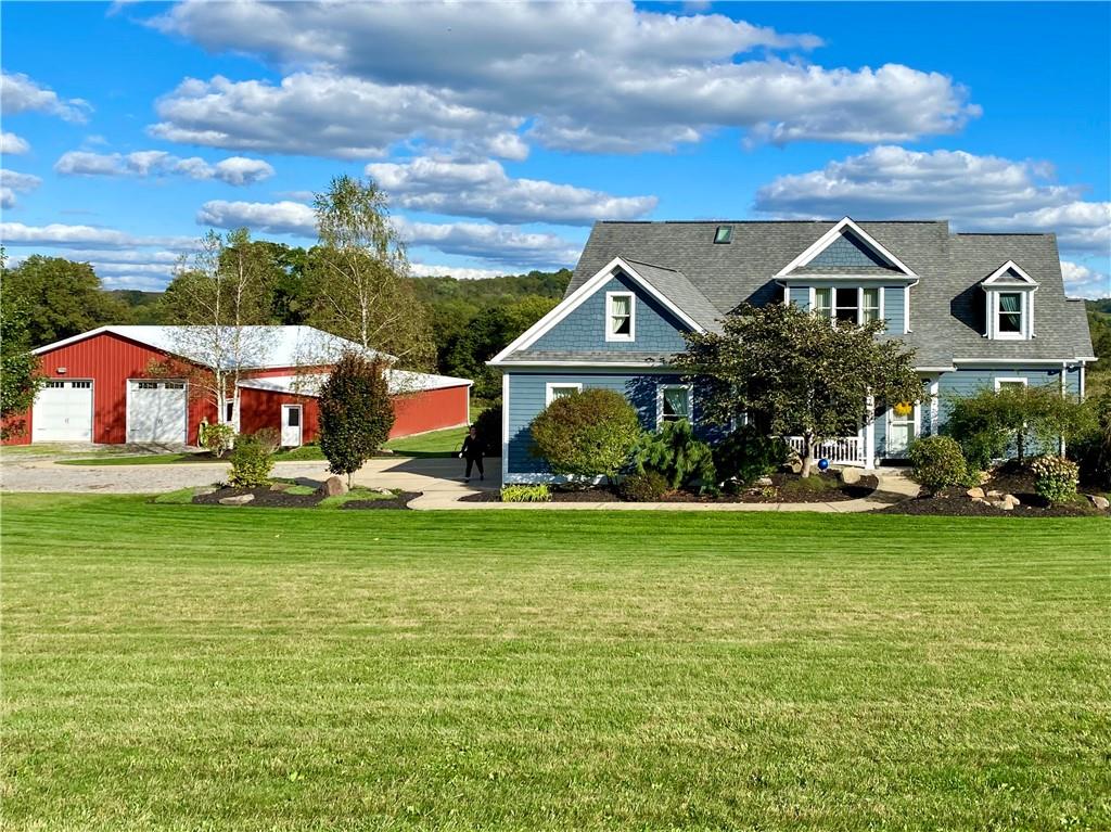 440 Wilson Road Worthington, PA 16262 - Photo 48 of 48 a front view of a house with a garden