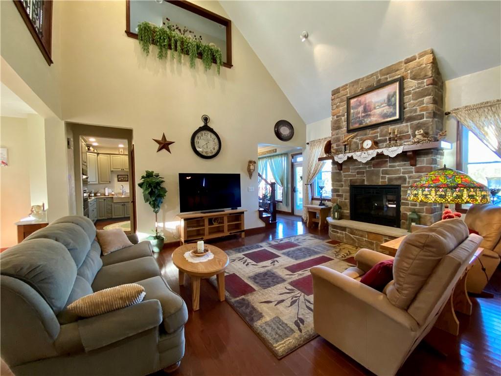 440 Wilson Road Worthington, PA 16262 - Photo 5 of 48 a living room with furniture a flat screen tv and a fireplace
