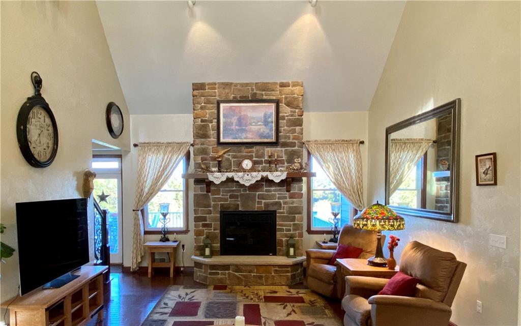 440 Wilson Road Worthington, PA 16262 - Photo 7 of 48 a living room with furniture a flat screen tv and a fireplace