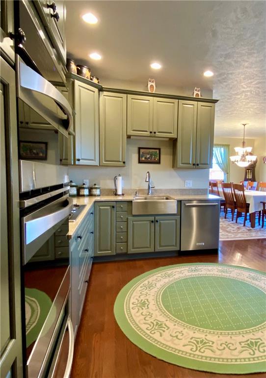 440 Wilson Road Worthington, PA 16262 - Photo 10 of 48 a kitchen with kitchen island stainless steel appliances a sink and cabinets