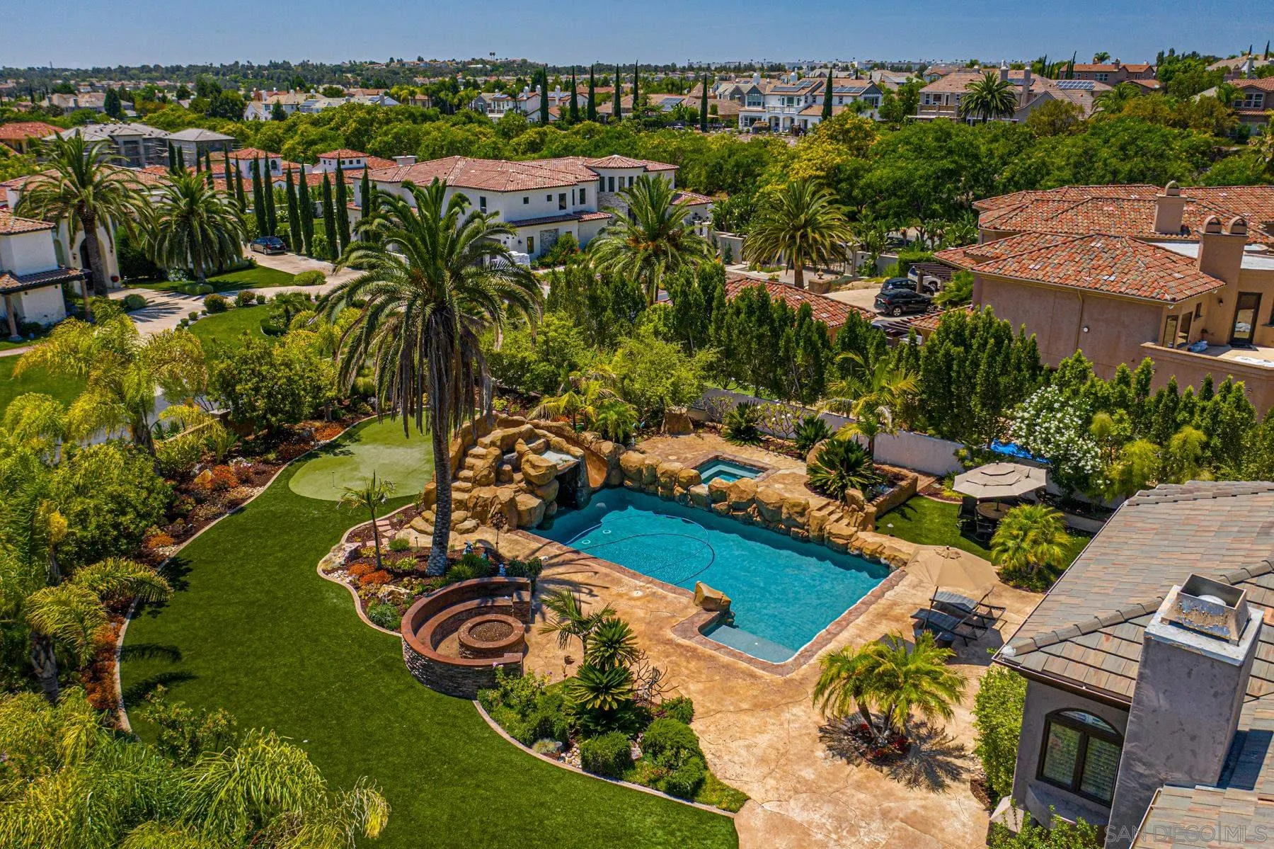 2871 Gate 3 Place Chula Vista, CA 91914 - Photo 15 of 73 an aerial view of a house with a garden and lake view