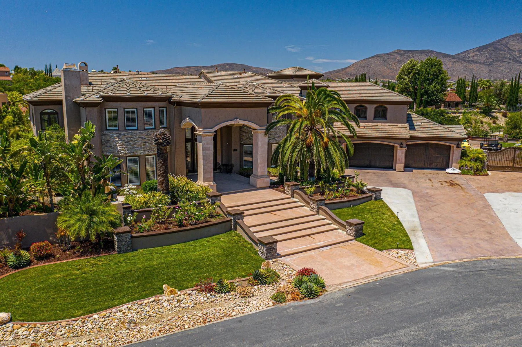 2871 Gate 3 Place Chula Vista, CA 91914 - Photo 16 of 73 a front view of a house with a garden