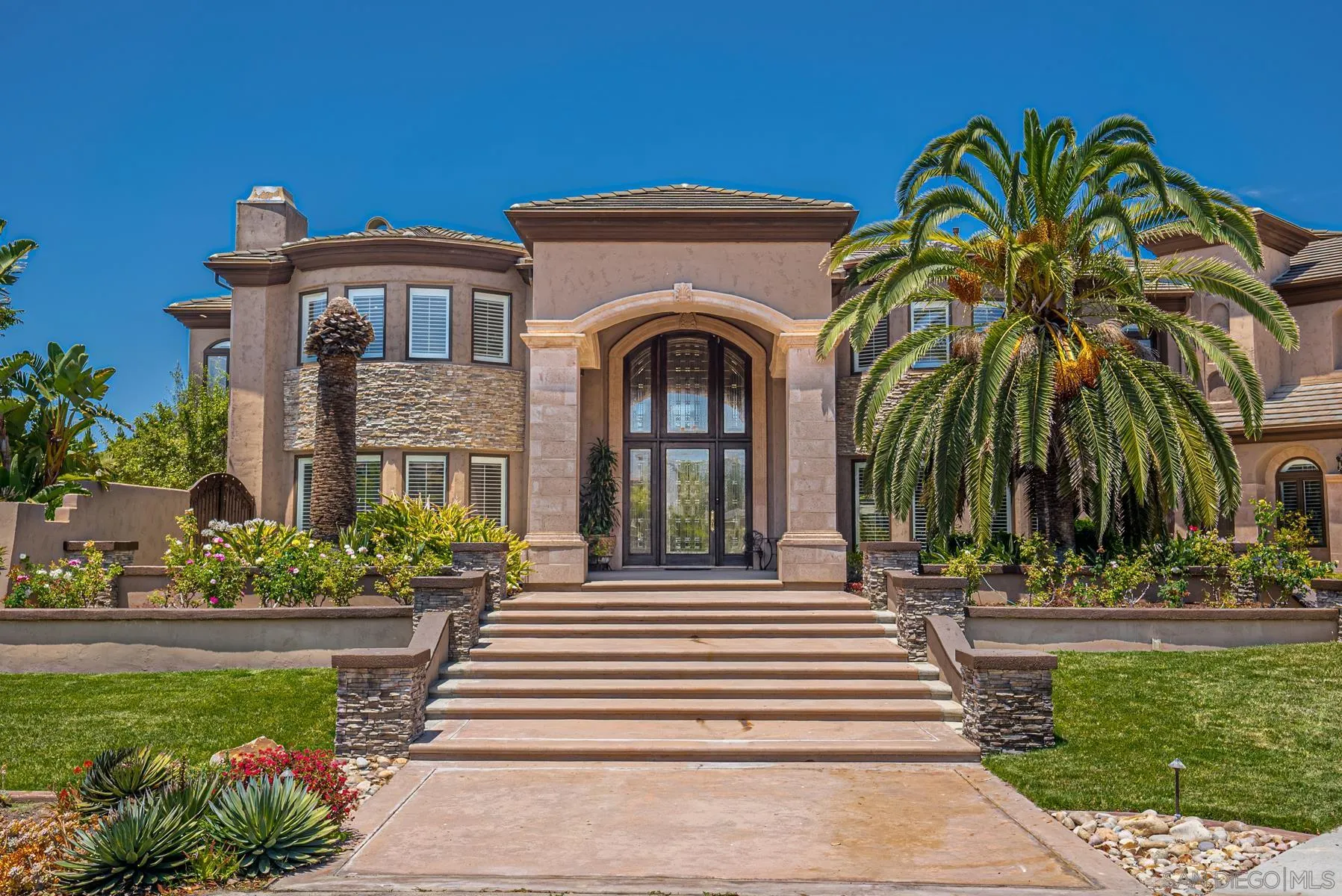 2871 Gate 3 Place Chula Vista, CA 91914 - Photo 19 of 73 a front view of a house with a garden