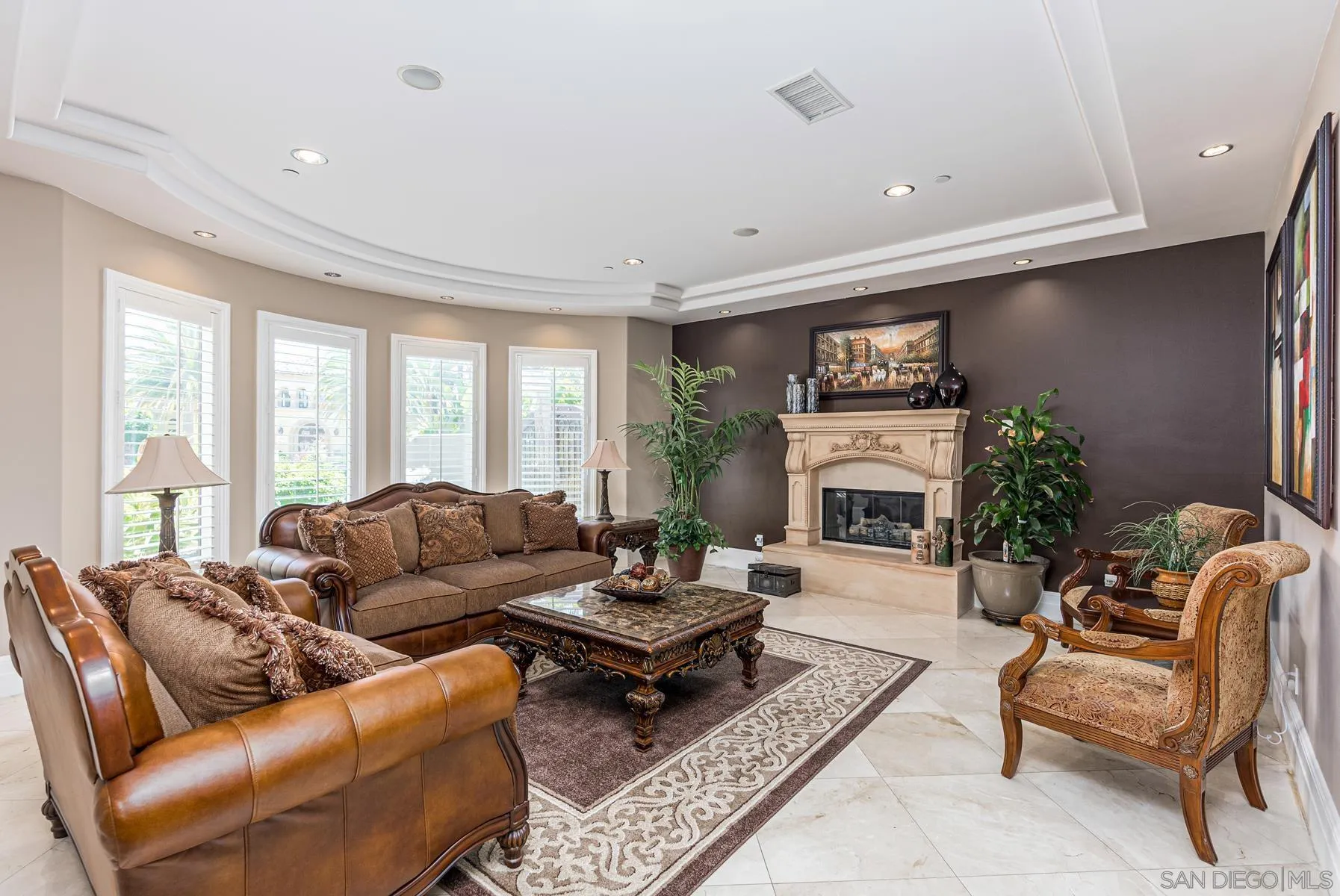 2871 Gate 3 Place Chula Vista, CA 91914 - Photo 21 of 73 a living room with furniture fireplace and a large window