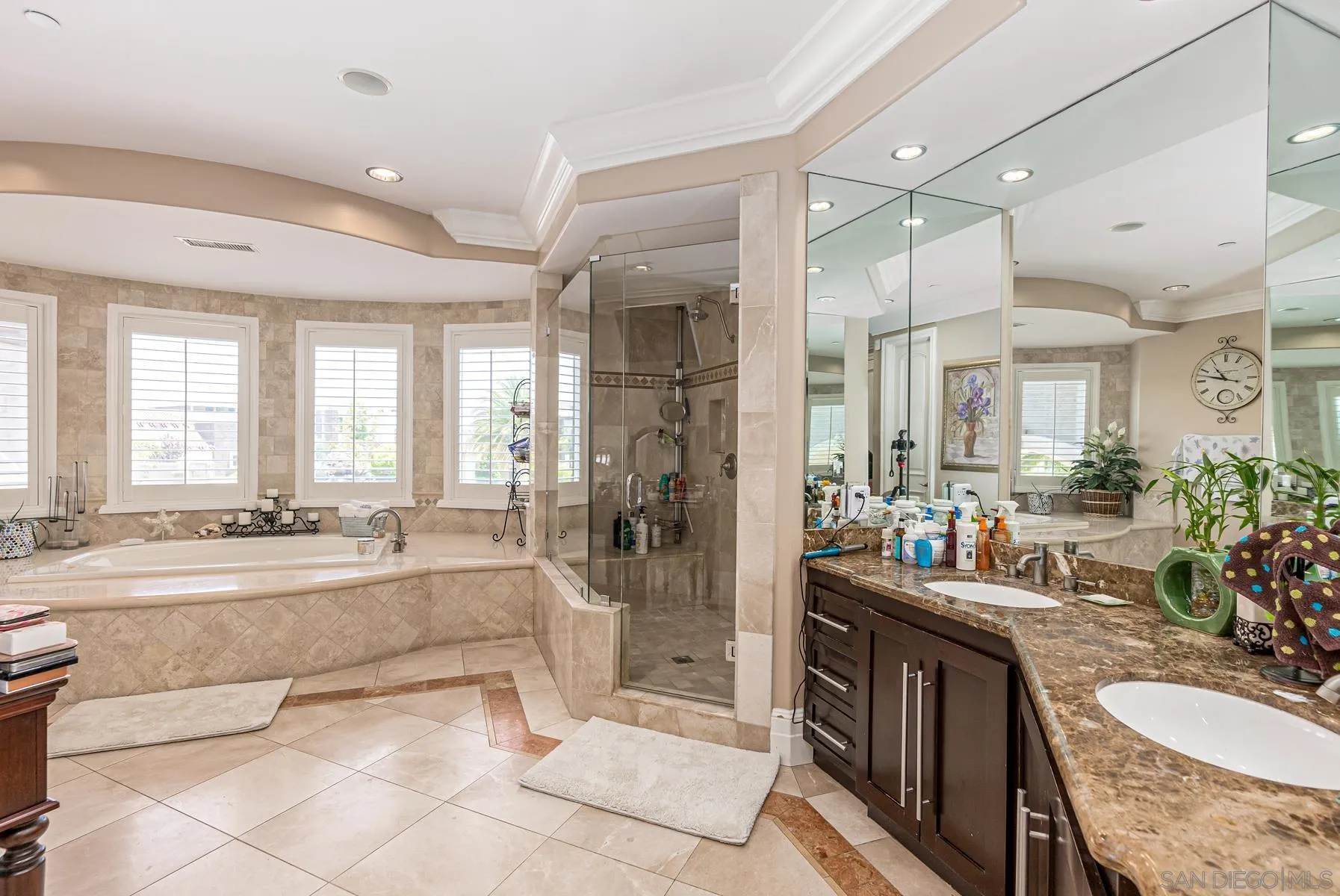 2871 Gate 3 Place Chula Vista, CA 91914 - Photo 31 of 73 a large spacious bathroom with a granite countertop tub shower and mirror