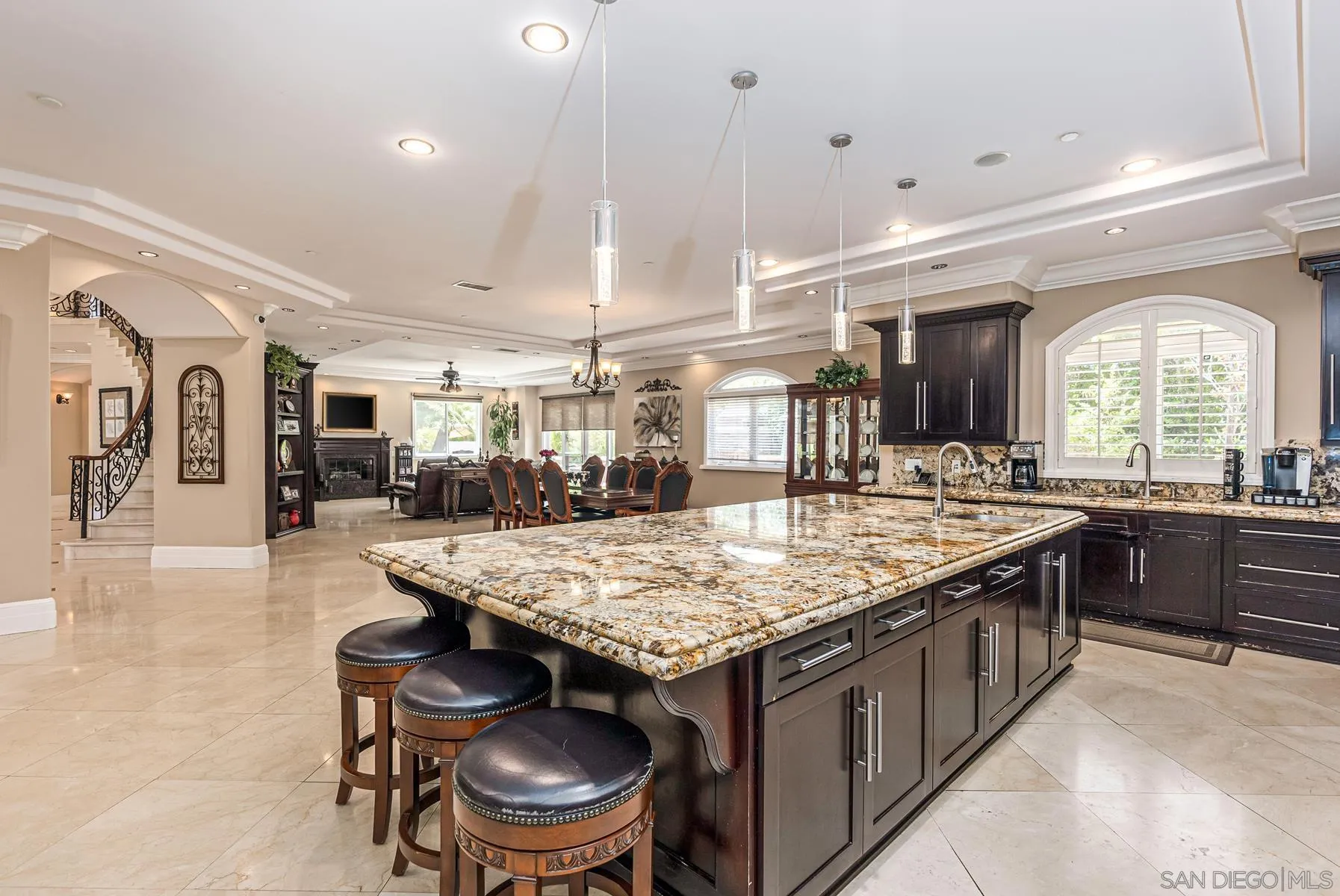 2871 Gate 3 Place Chula Vista, CA 91914 - Photo 48 of 73 a kitchen with a table and chairs in it