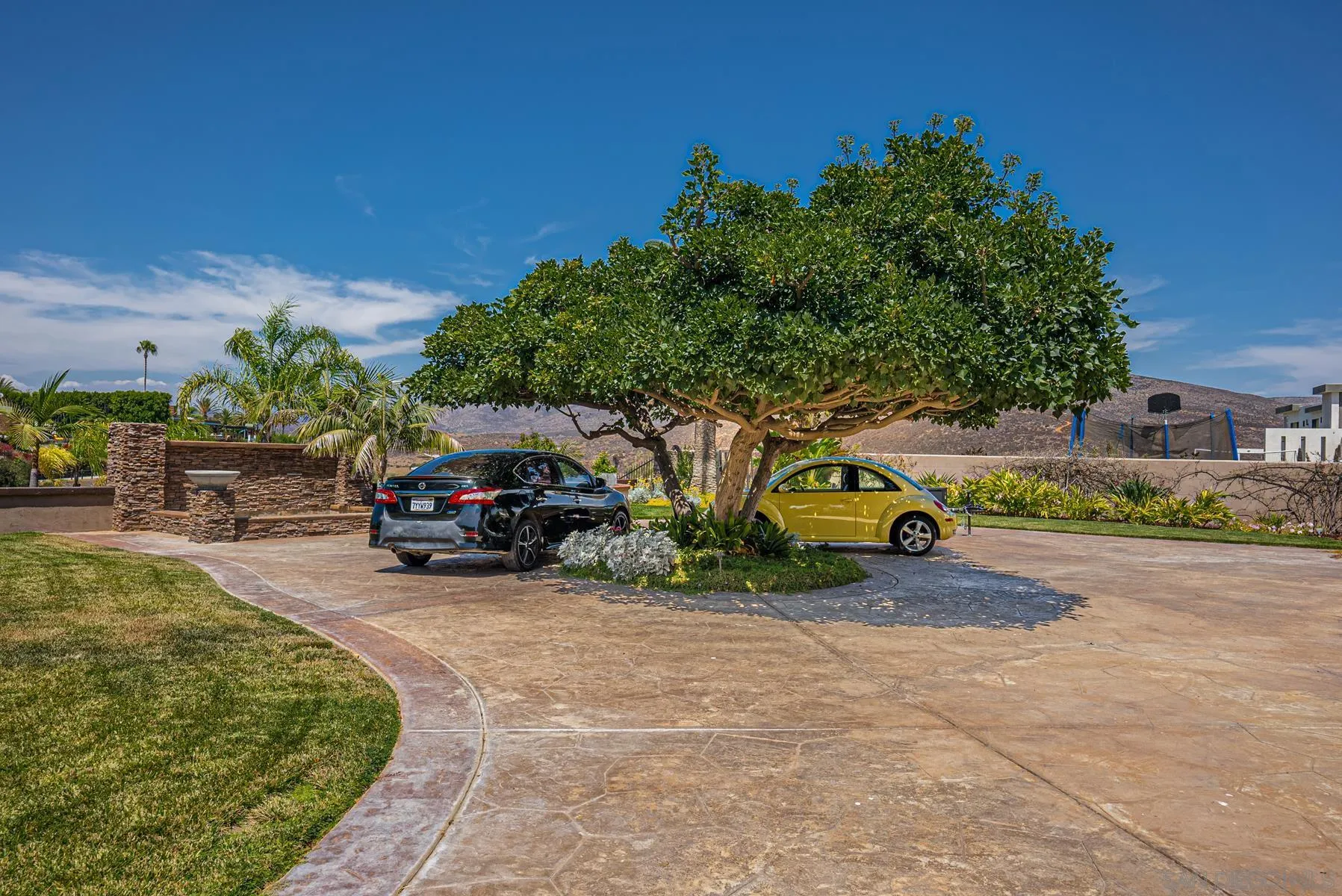 2871 Gate 3 Place Chula Vista, CA 91914 - Photo 69 of 73 a view of a backyard with plants and a patio
