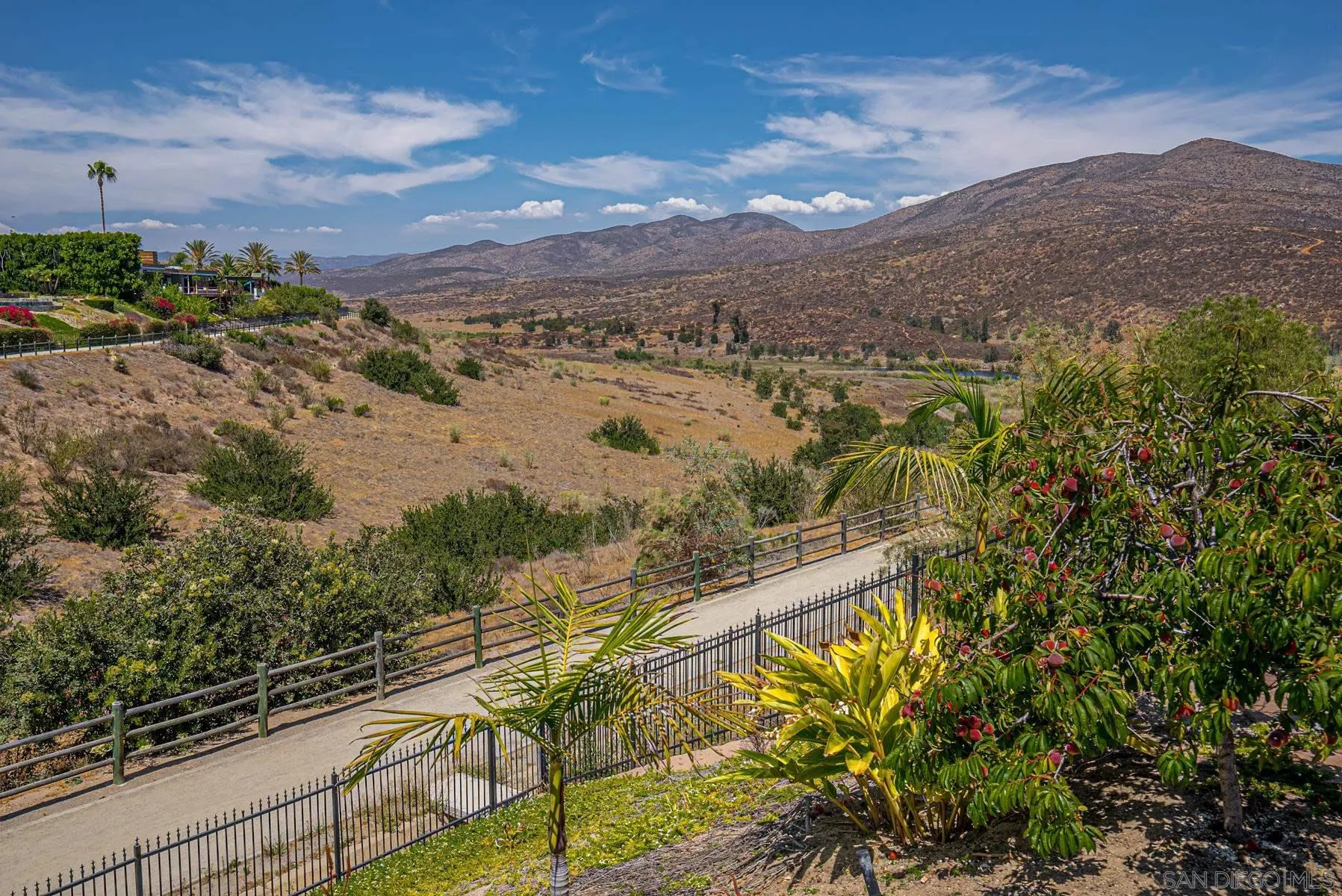 2871 Gate 3 Place Chula Vista, CA 91914 - Photo 70 of 73 a view of a lake with a mountain in the background