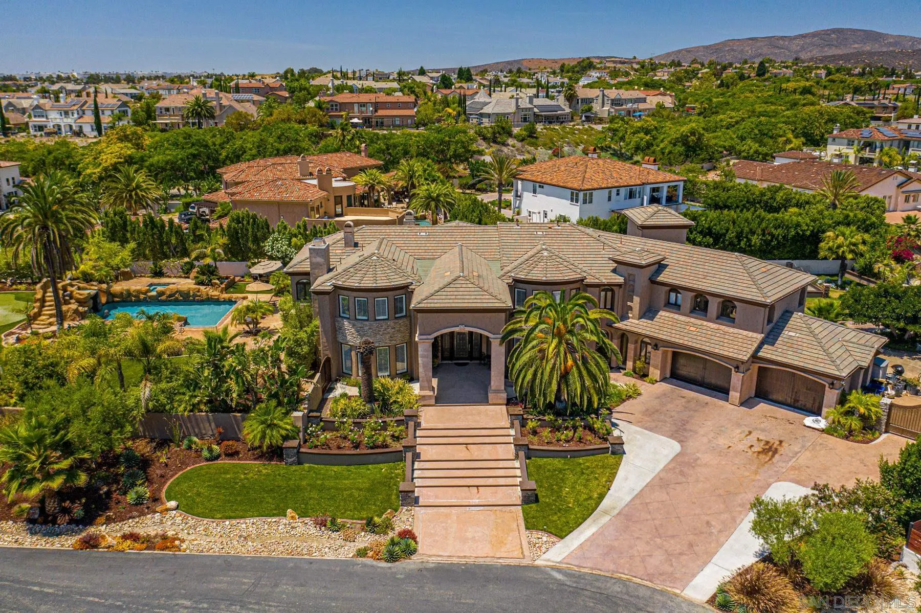 2871 Gate 3 Place Chula Vista, CA 91914 - Photo 8 of 73 an aerial view of a house with a garden and plants
