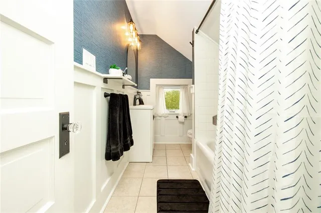 a bathroom with a sink and a shower