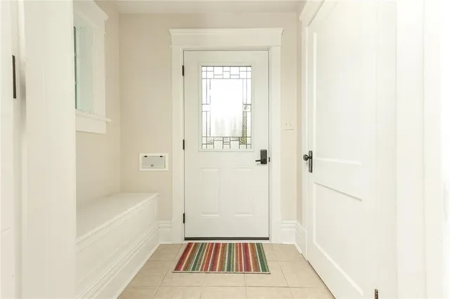 a bathroom with a tub and shower