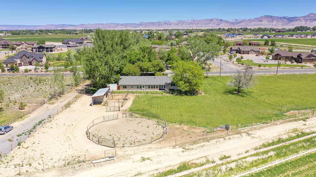 2251 J Road Grand Junction, CO 81505 - Photo 33 of 41 an aerial view of a house with a ocean view