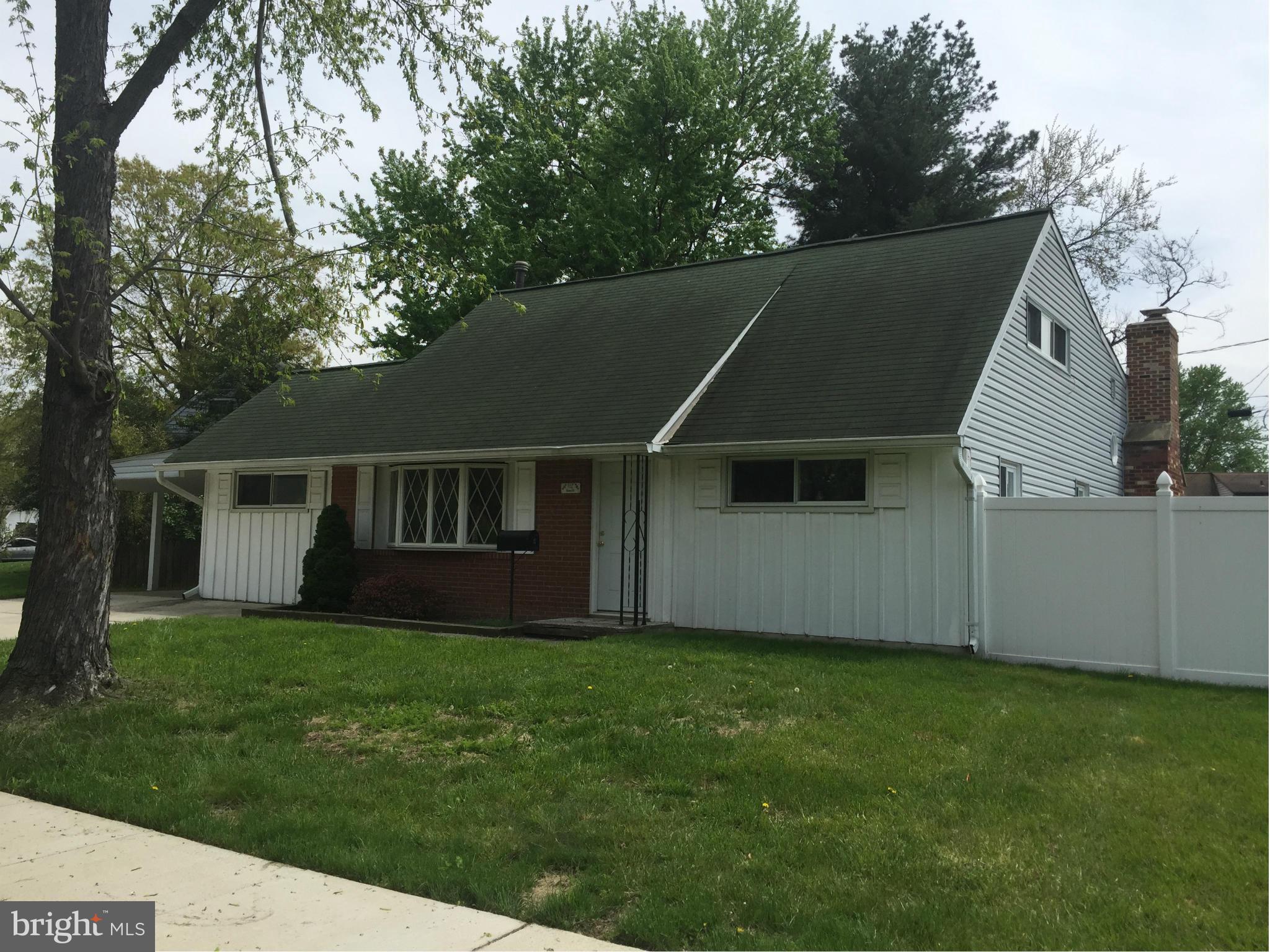 112 Thomas Road Glen Burnie, MD 21060 - Photo 1 of 30 a view of a house with a backyard