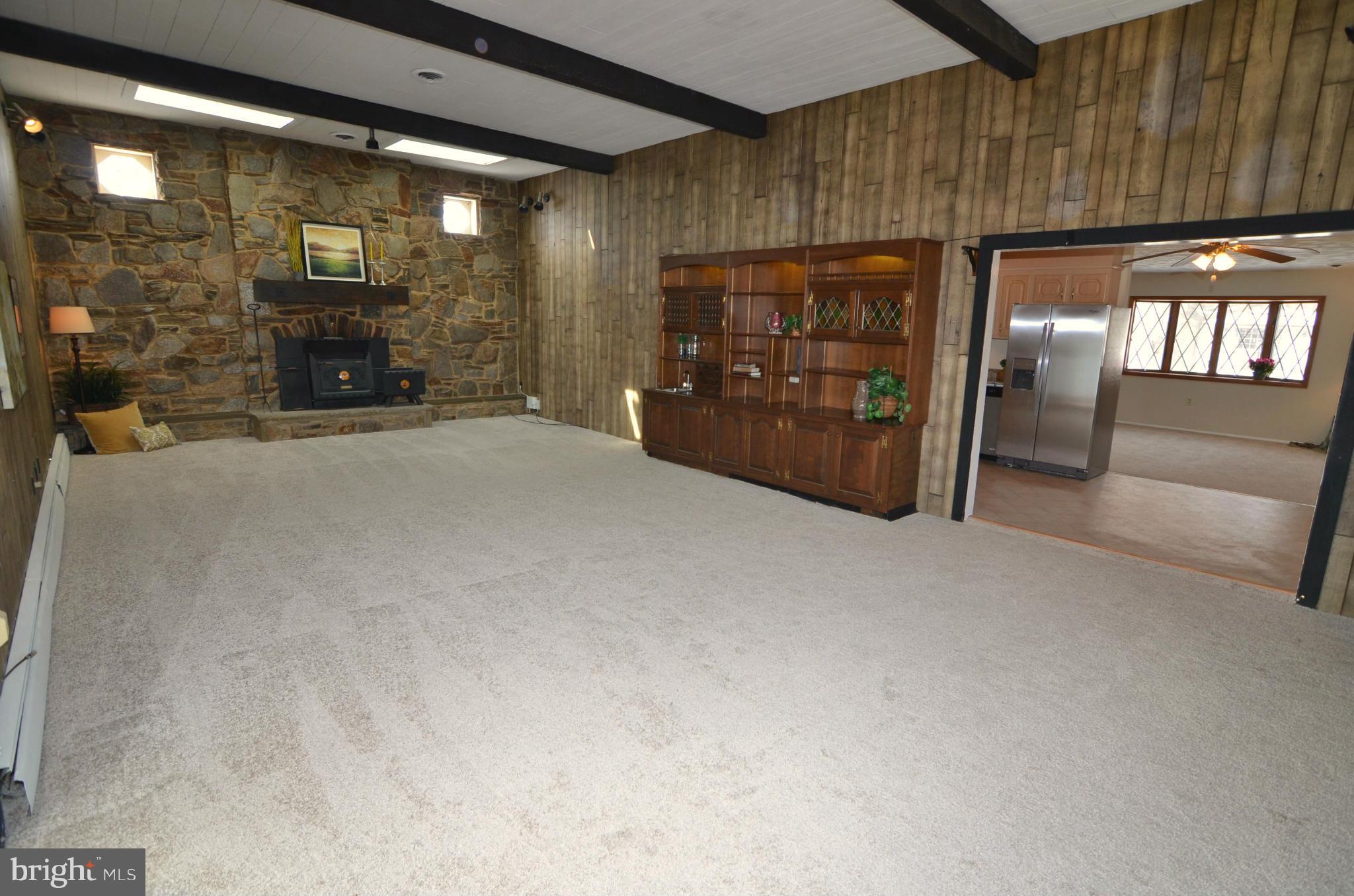 112 Thomas Road Glen Burnie, MD 21060 - Photo 13 of 30 a view of a livingroom with a fireplace