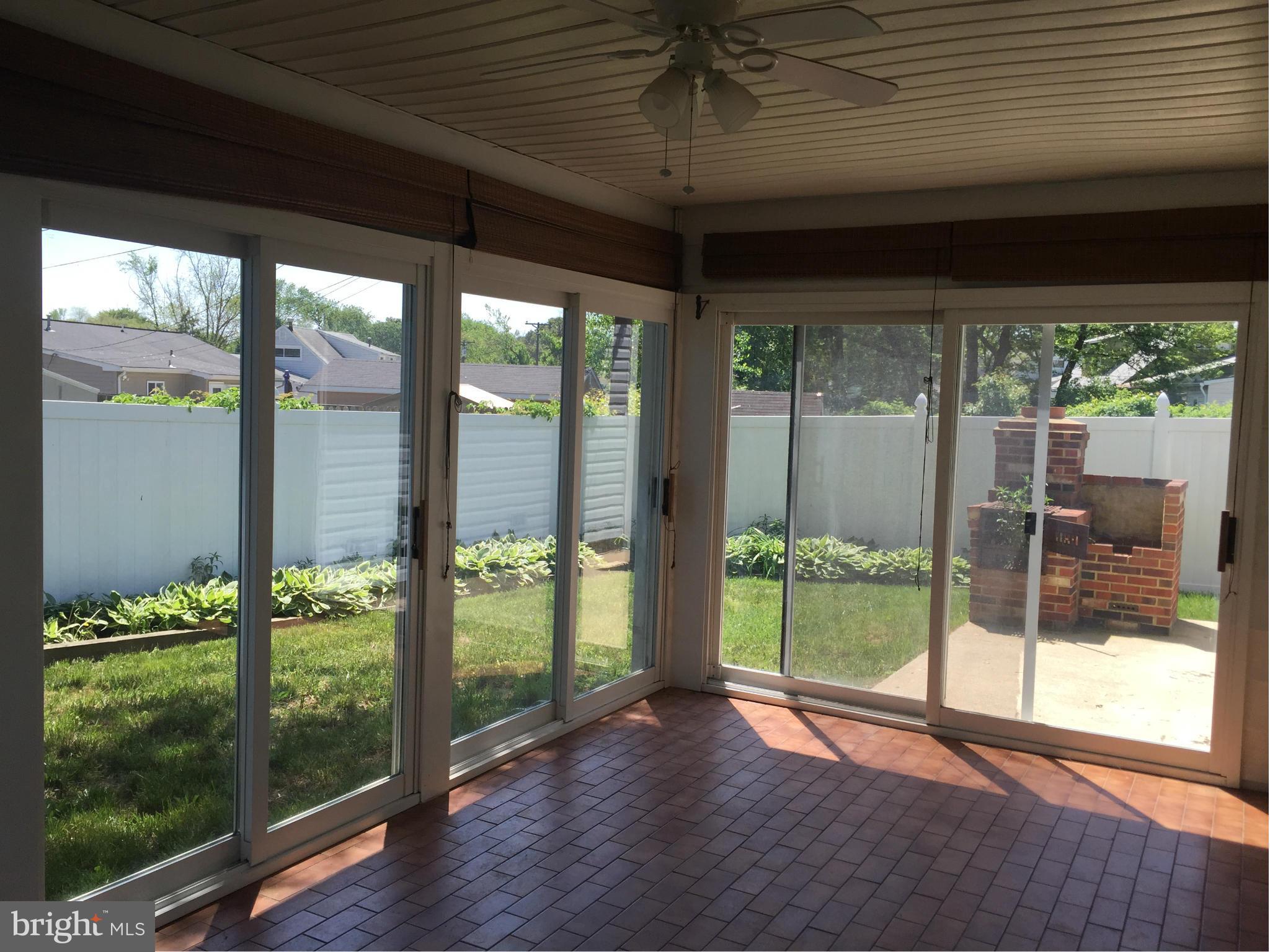 112 Thomas Road Glen Burnie, MD 21060 - Photo 19 of 30 a view of a porch with furniture and garden