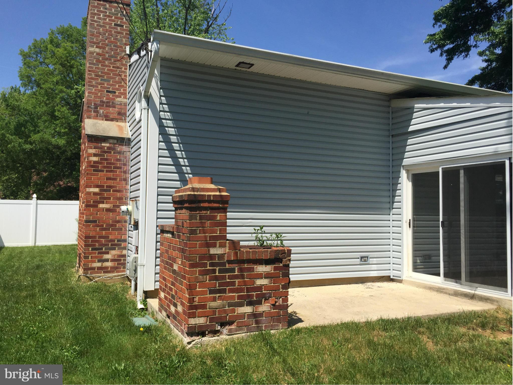 112 Thomas Road Glen Burnie, MD 21060 - Photo 20 of 30 a view of a house with a yard