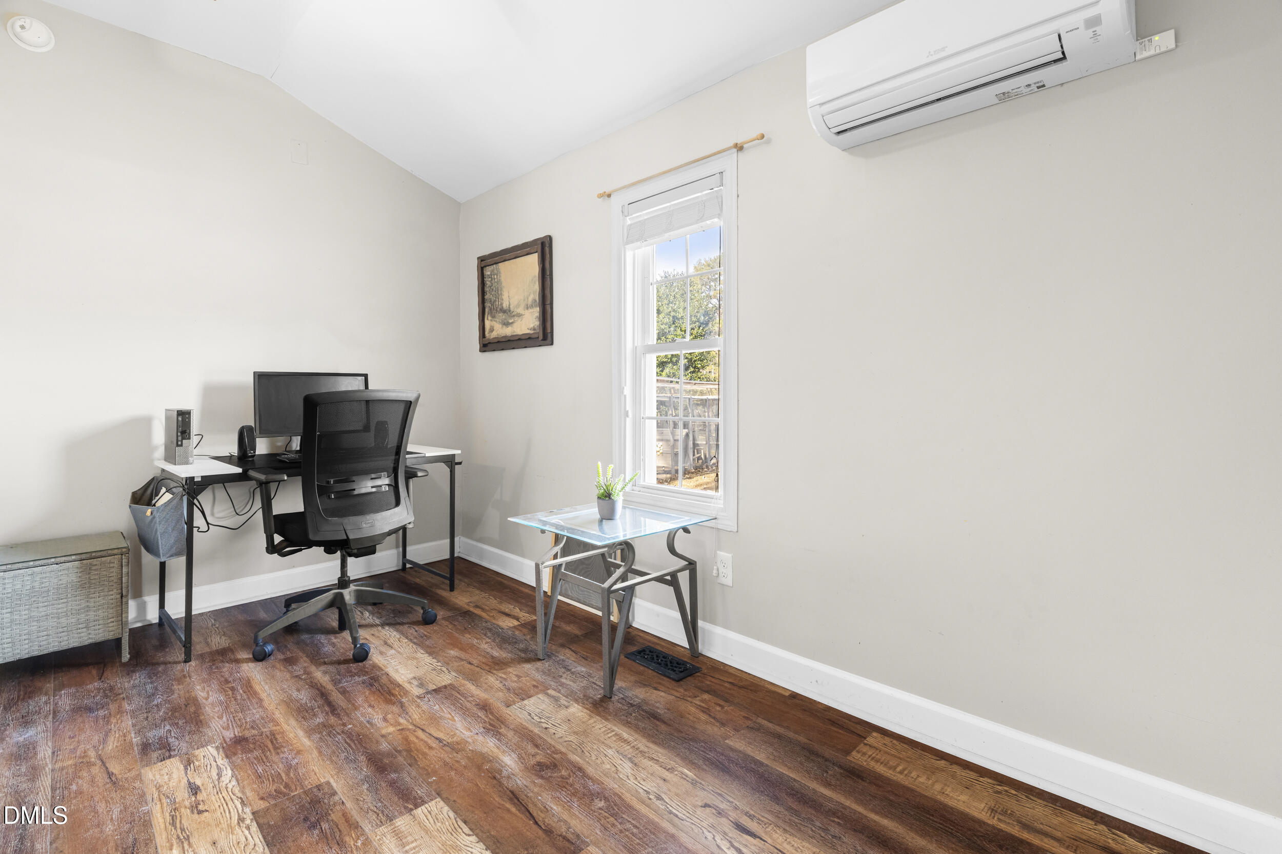 215 Old Stancil Road Kenly, NC 27542 - Photo 12 of 21 a workspace with wooden floor and a window