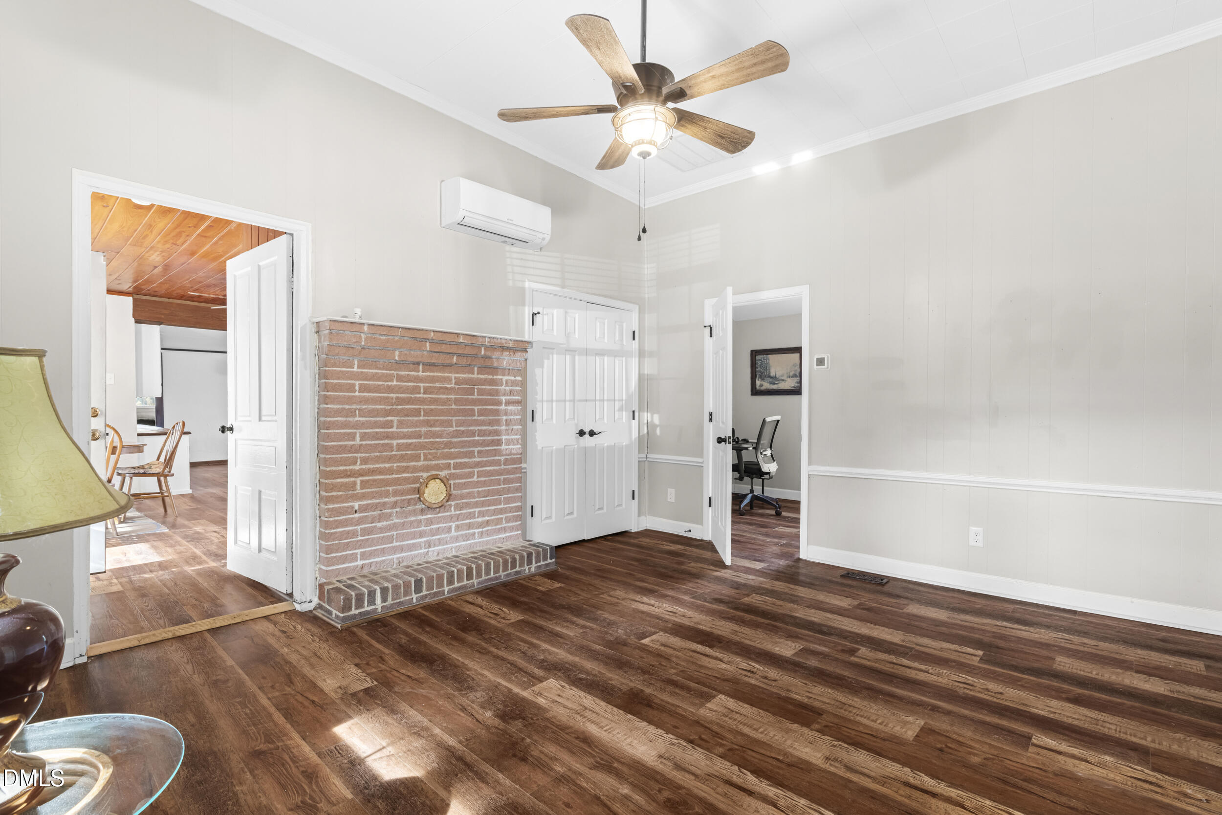215 Old Stancil Road Kenly, NC 27542 - Photo 13 of 21 a view of empty room with wooden floor