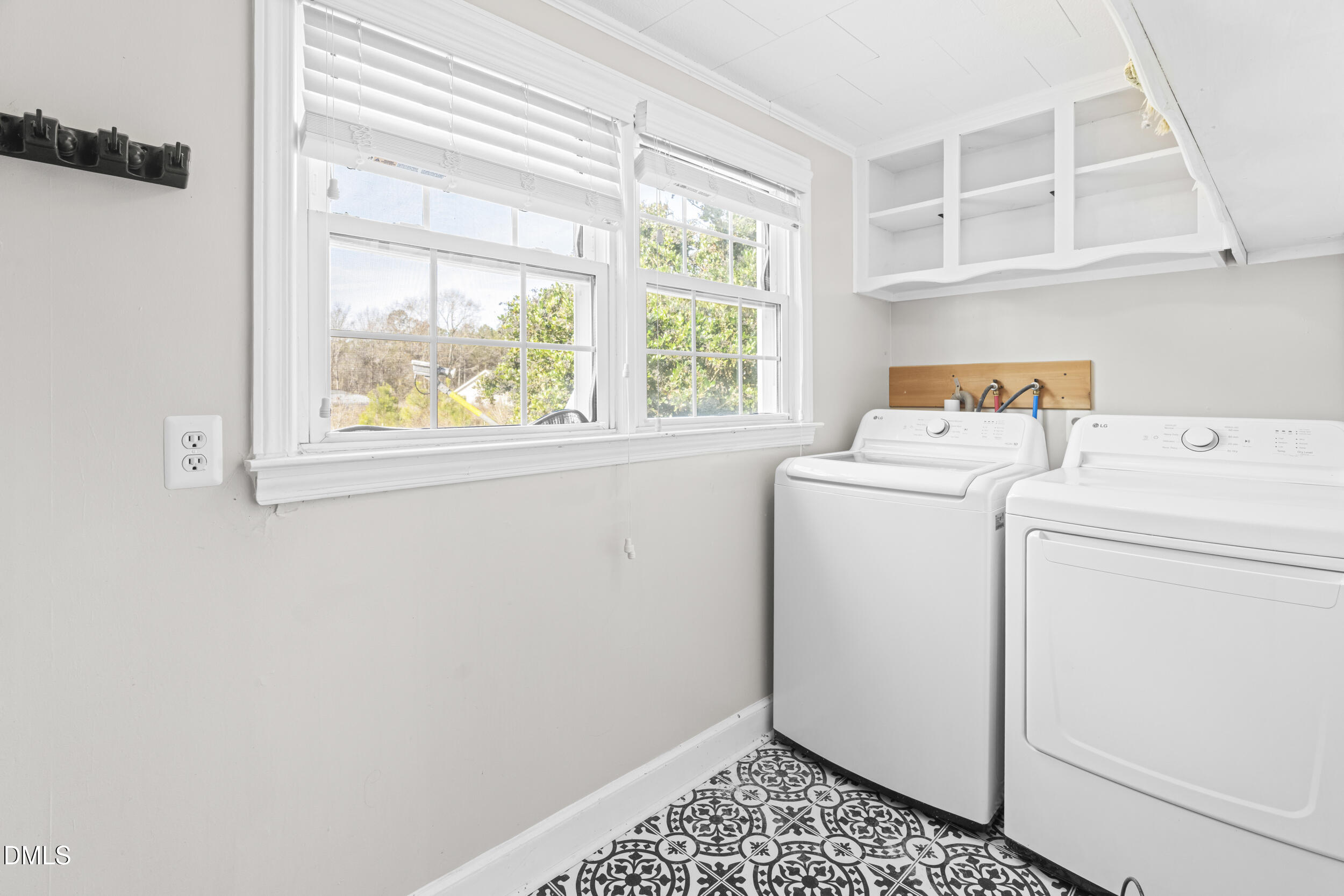 215 Old Stancil Road Kenly, NC 27542 - Photo 16 of 21 a utility room with dryer and washer