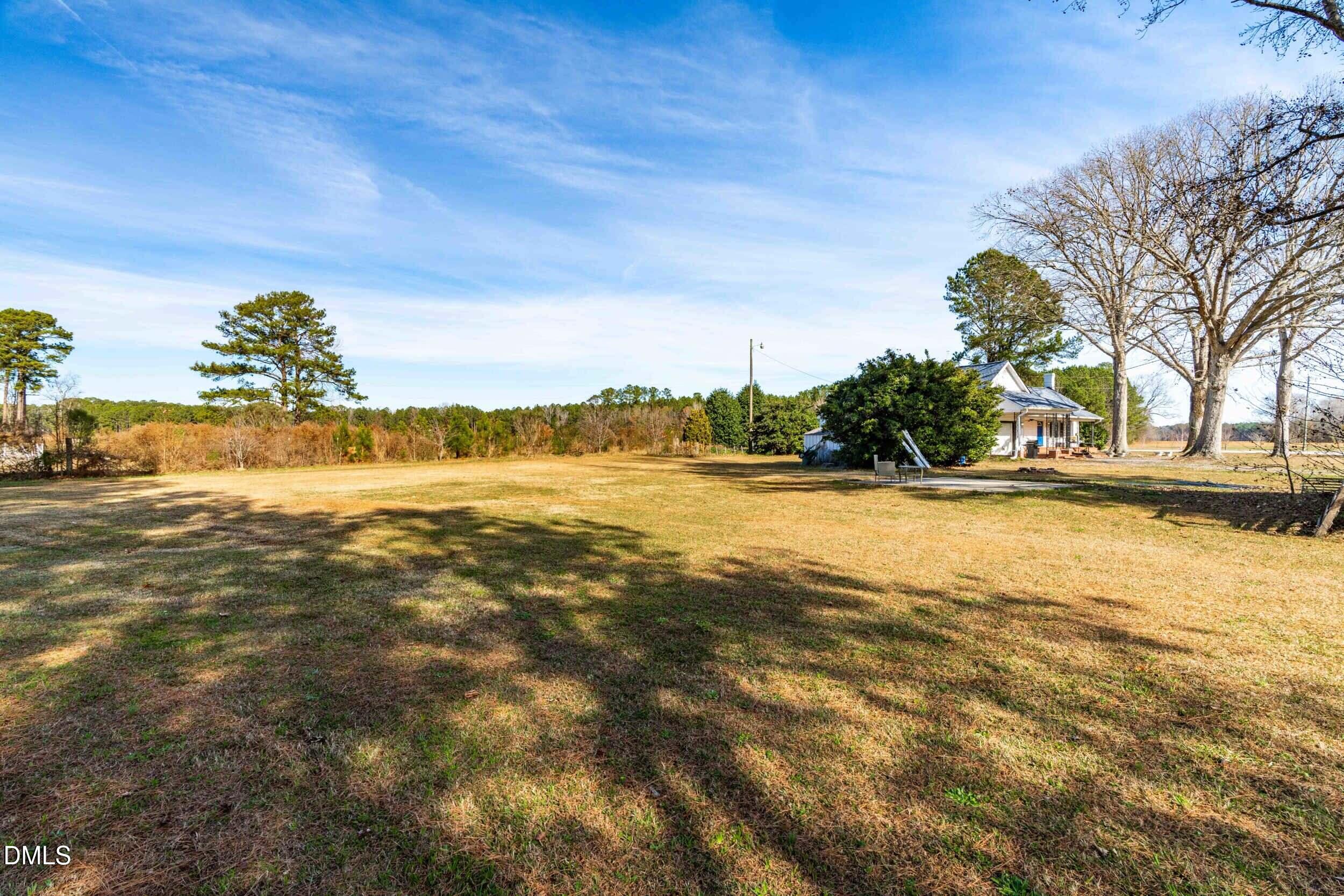 215 Old Stancil Road Kenly, NC 27542 - Photo 18 of 21 a view of an ocean and beach