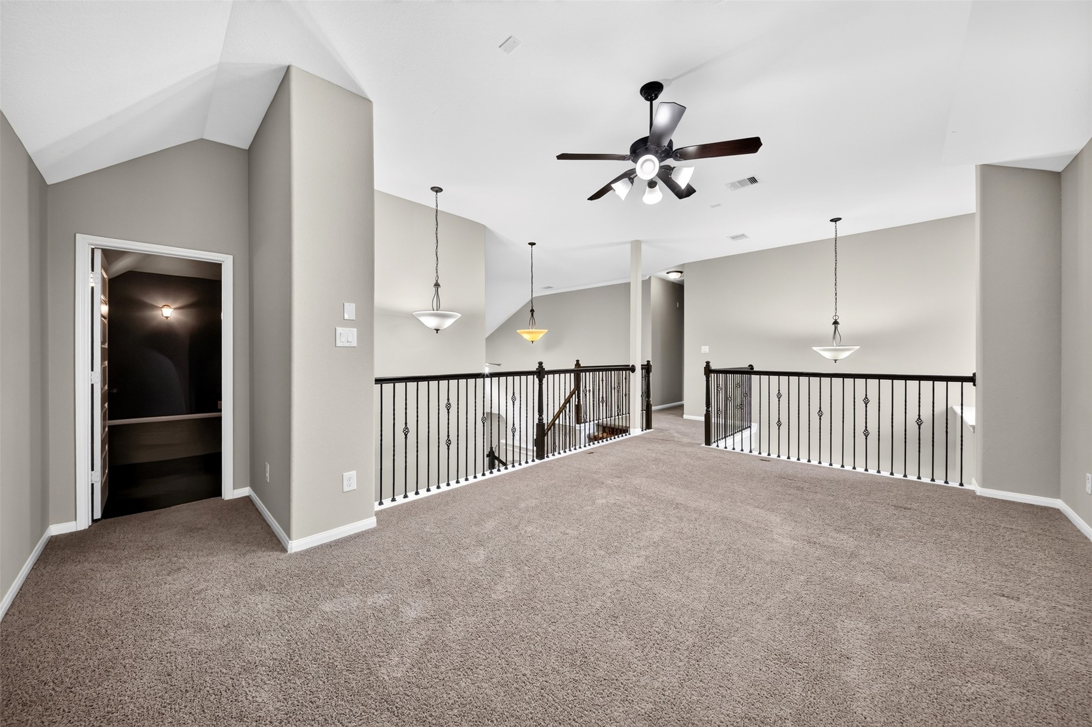 6234 Avon Landing Lane Spring, TX 77379 - Photo 49 of 49 Another view of the gameroom upstairs showing the open floorplan of the home and the light airy feel of the home.