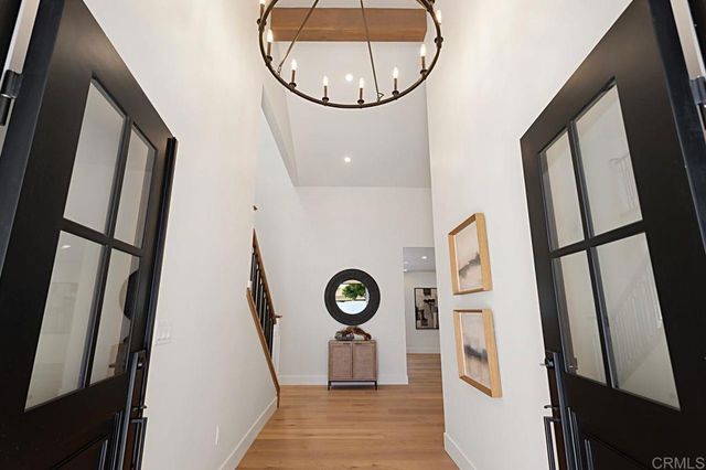 a living room with furniture a rug and a fireplace