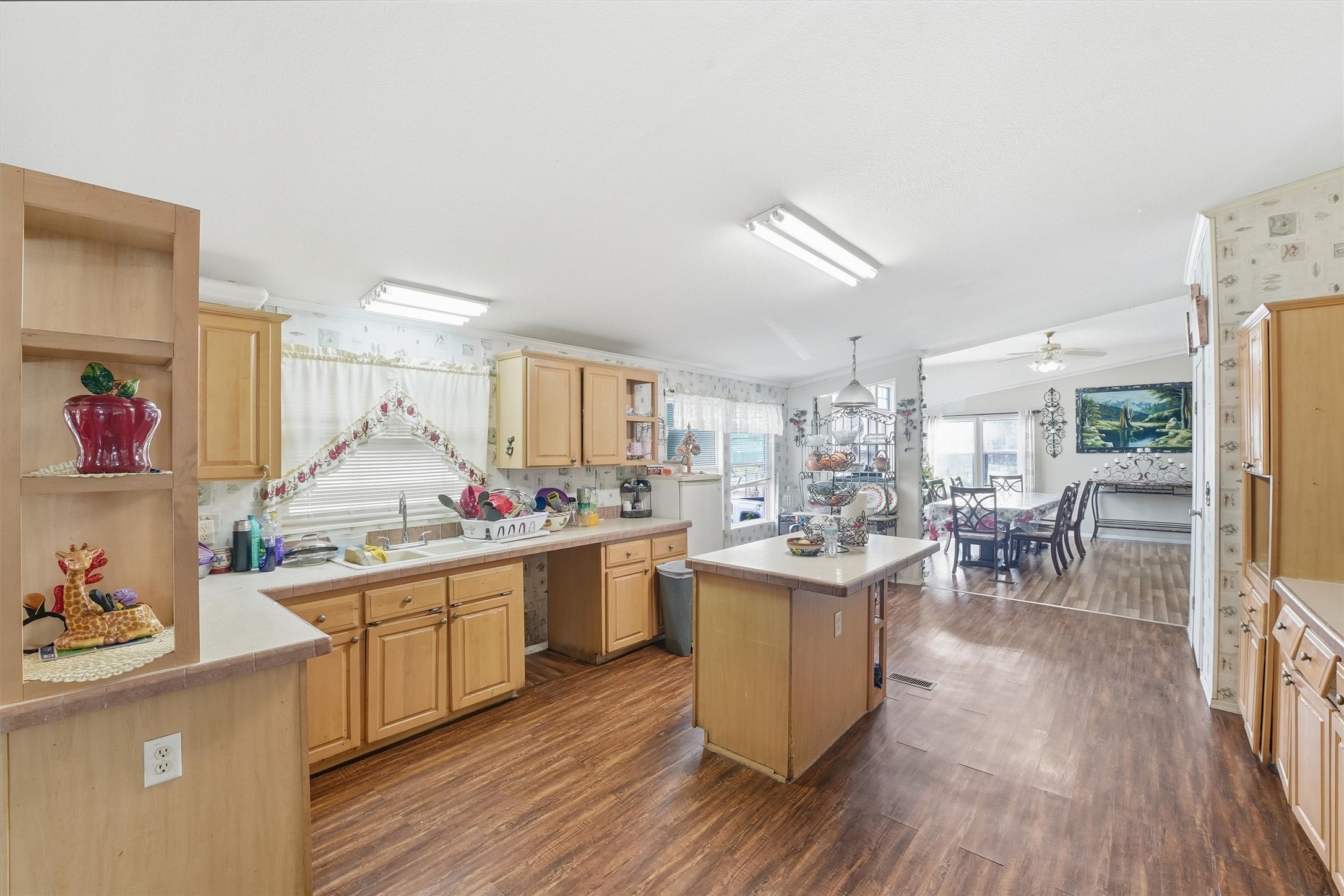1017 Woodland Street Channelview, TX 77530 - Photo 15 of 25 a kitchen with a sink and cabinets