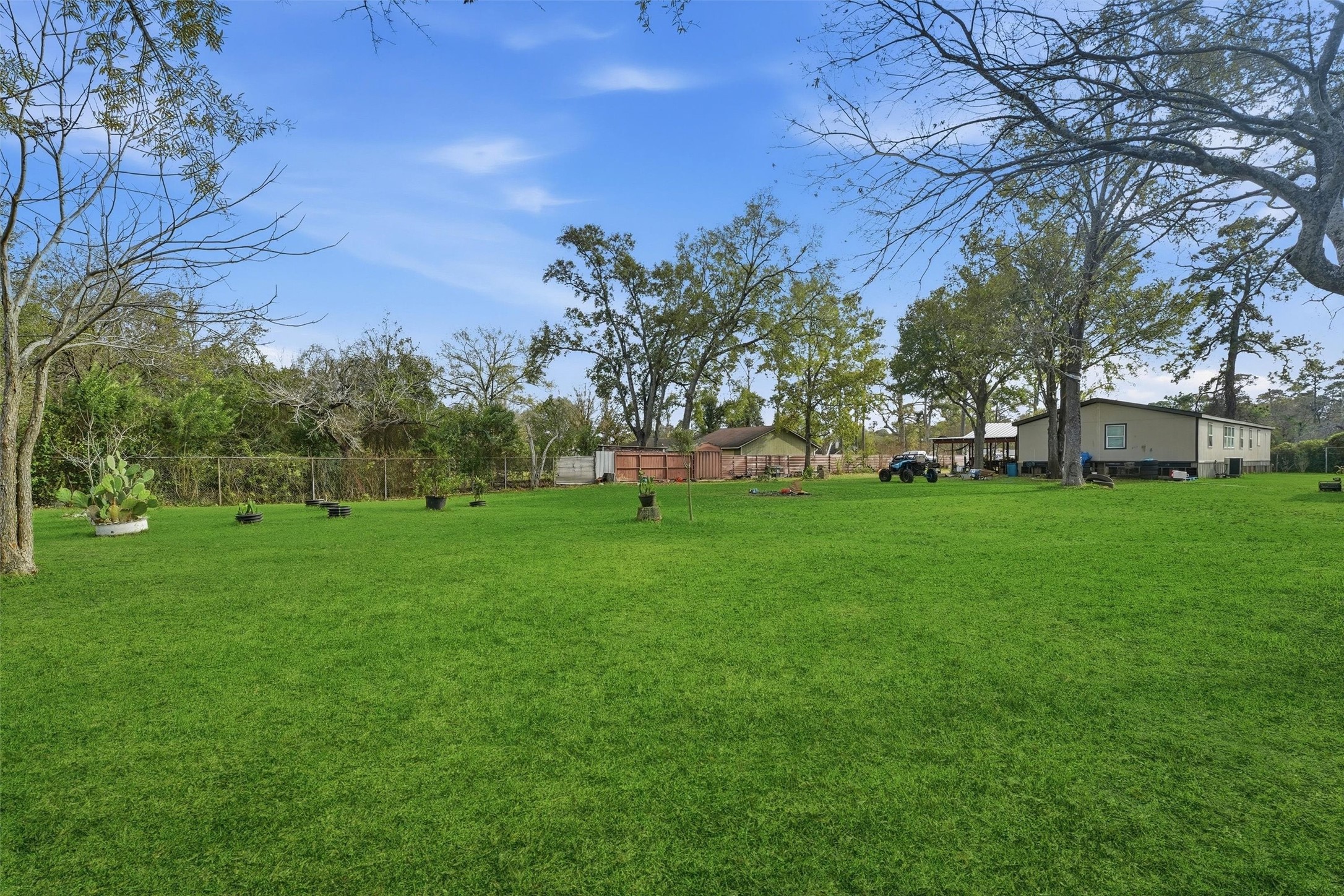1017 Woodland Street Channelview, TX 77530 - Photo 20 of 25 a view of a park with large trees