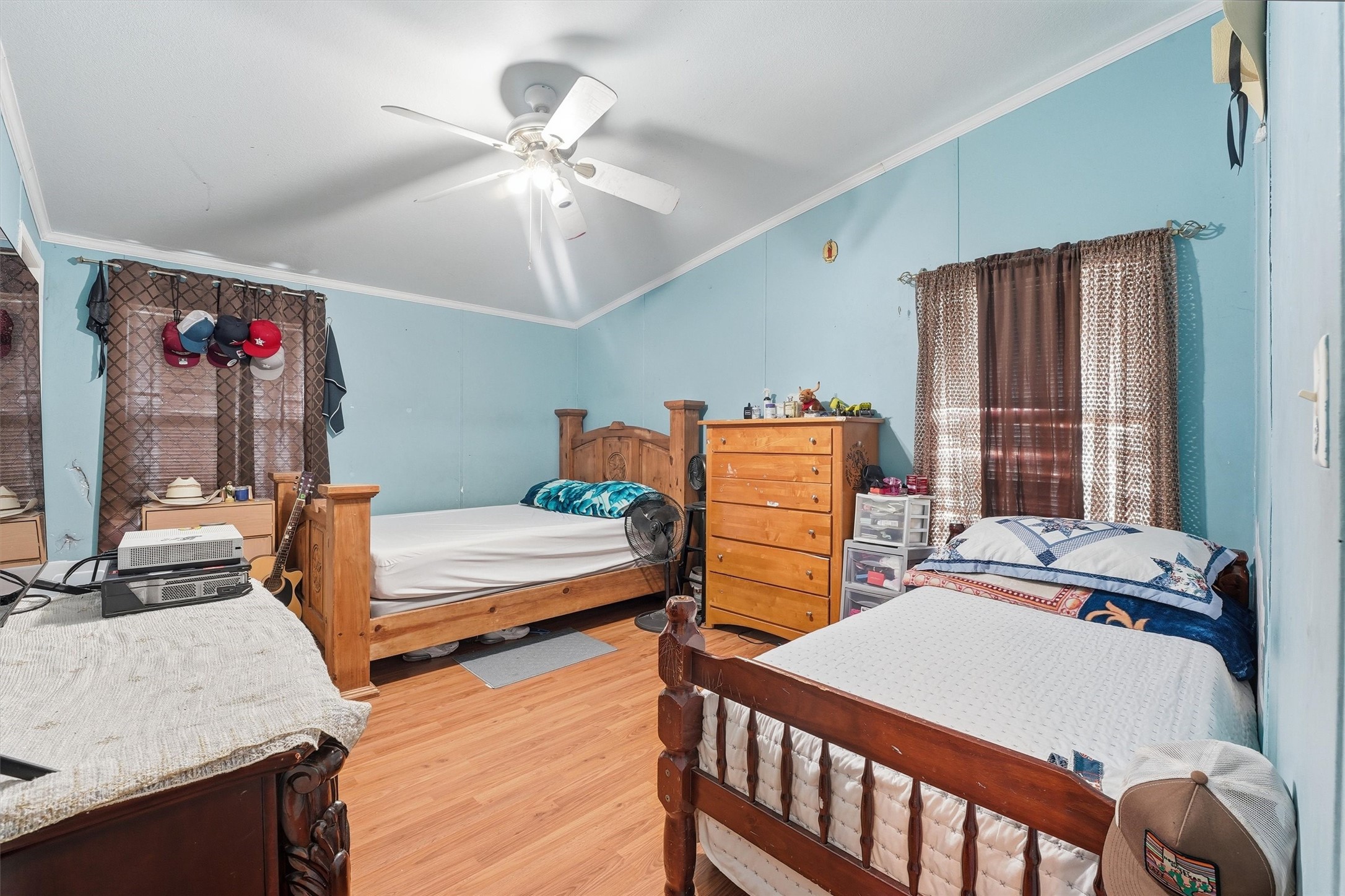 1017 Woodland Street Channelview, TX 77530 - Photo 7 of 25 a bedroom with a bed and dresser