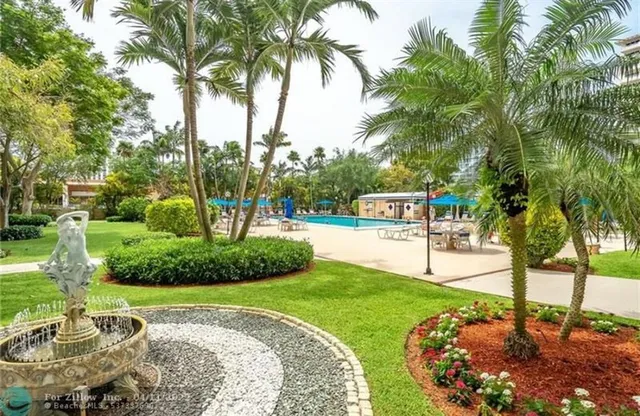 a view of a park with a tree