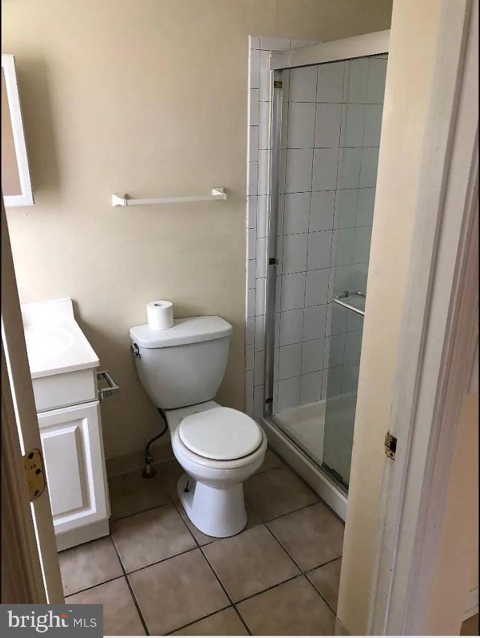 228 East Main Street Elkton, MD 21921 - Photo 7 of 29 a bathroom with a toilet and a shower