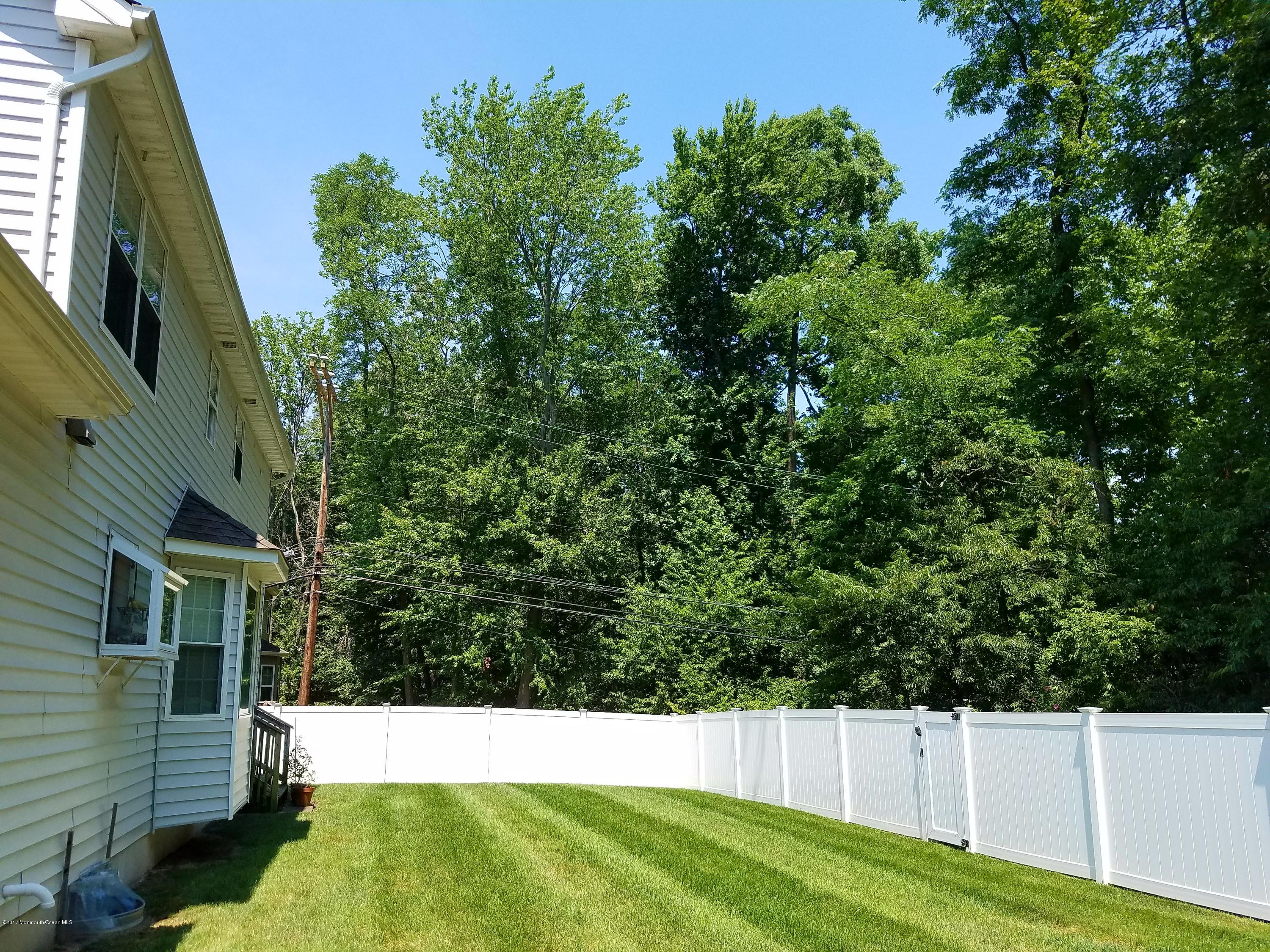 126 Robin Road Neptune Township, NJ 07753 - Photo 5 of 24 a view of an outdoor space and a yard