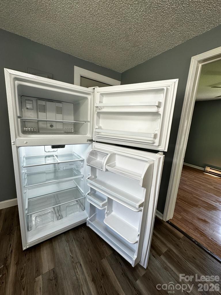 435 Davis Street Albemarle, NC 28001 - Photo 13 of 30 a storage room with wooden floor